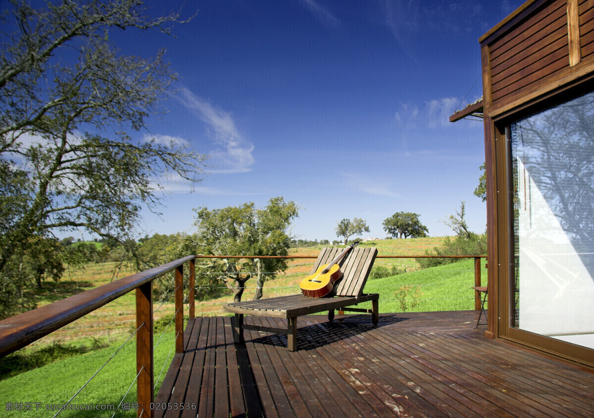 太阳 椅 上 吉它 蓝天 白云 树 草地 木板 太阳椅 房子 建筑物 自然风景 自然景观 黑色