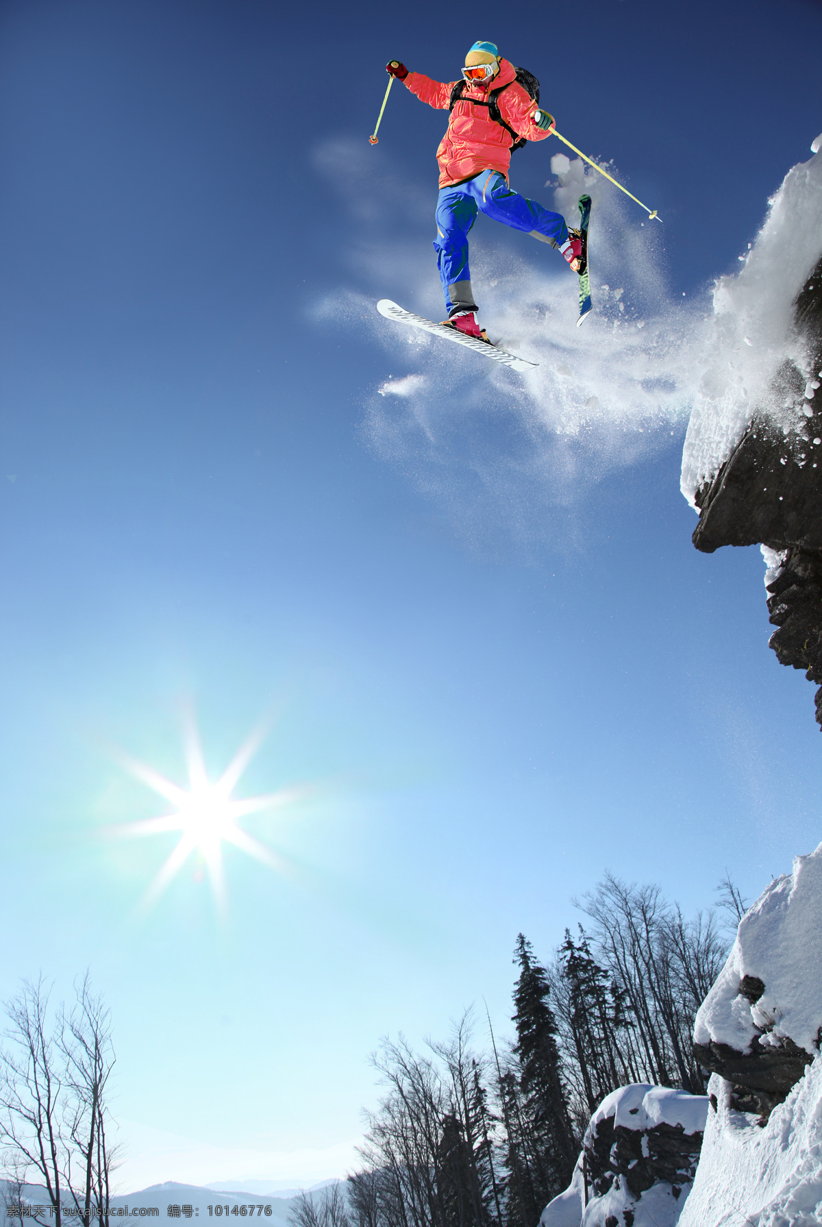山崖 飞下 滑雪 运动员 太阳 蓝天 极限运动 滑雪图片 生活百科